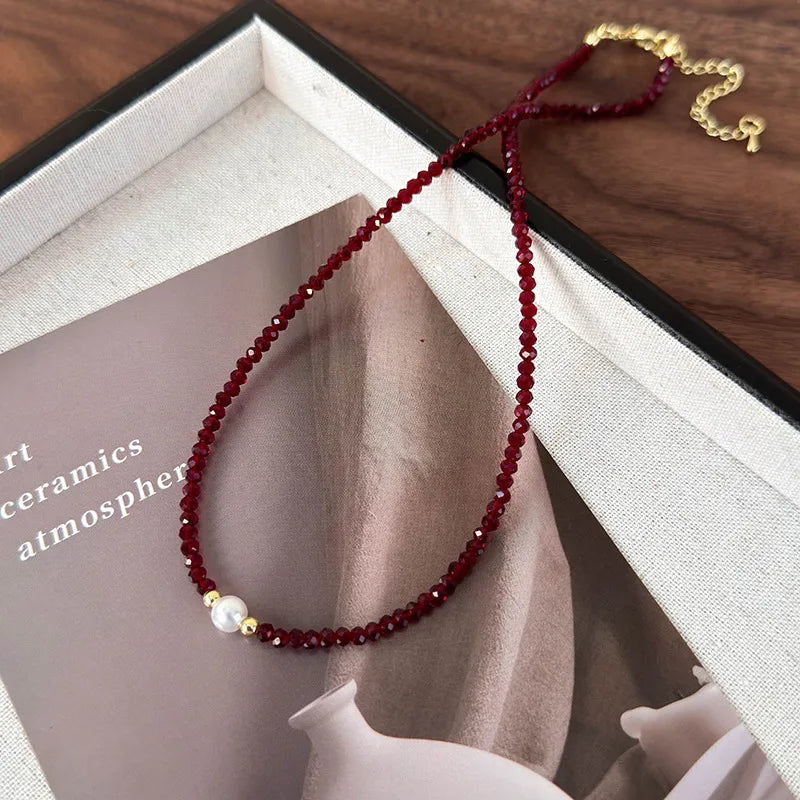 'Red Wine' necklace with a small round pearl